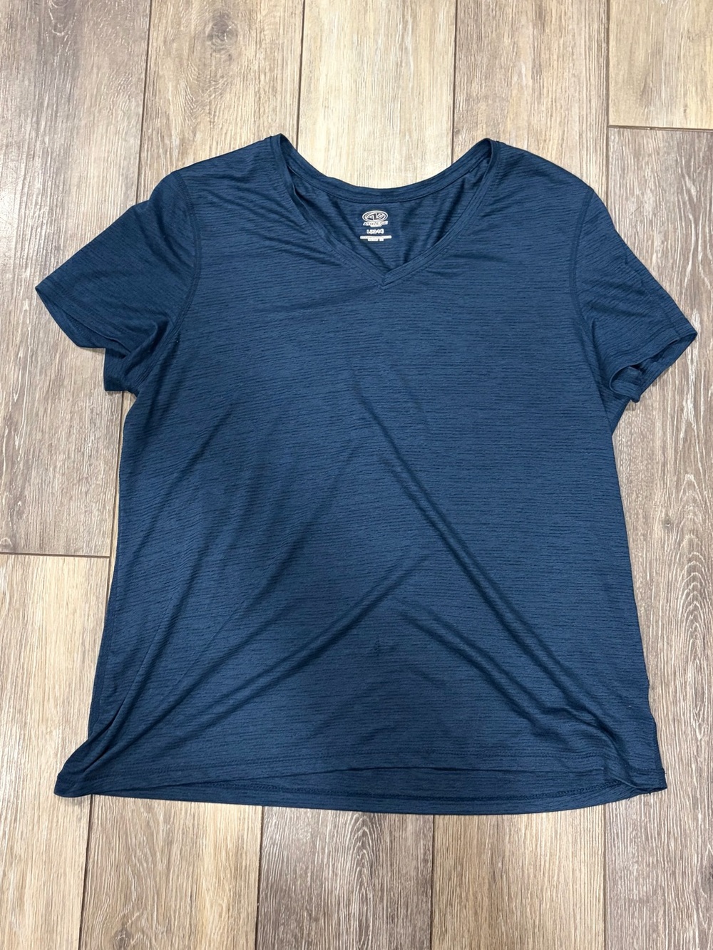 Athletic Works women’s performance T‑shirt, size L (12–14)